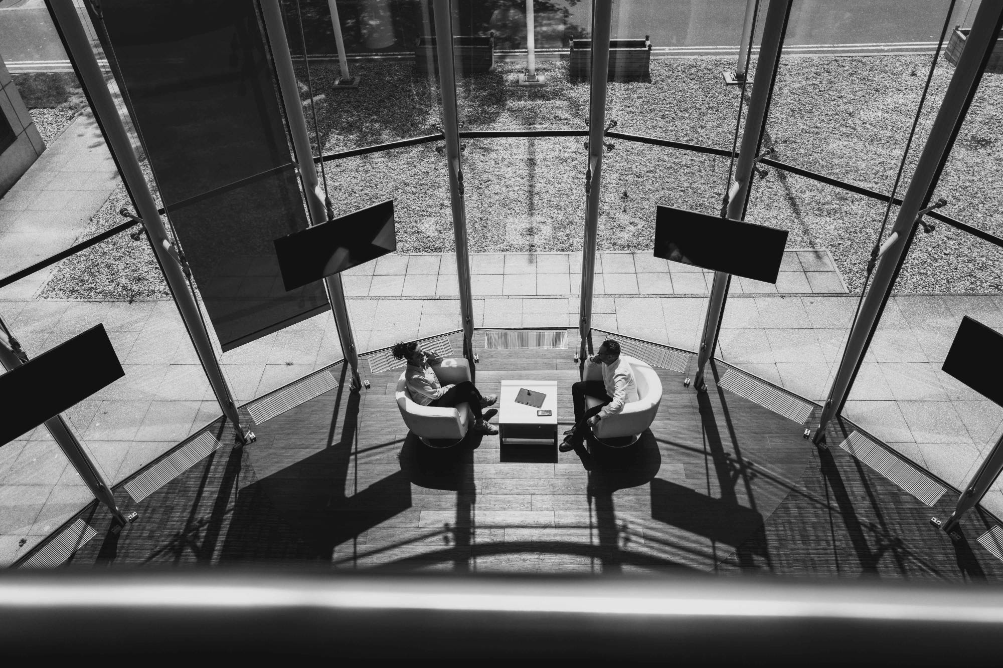 A confidential conversation, seen from above