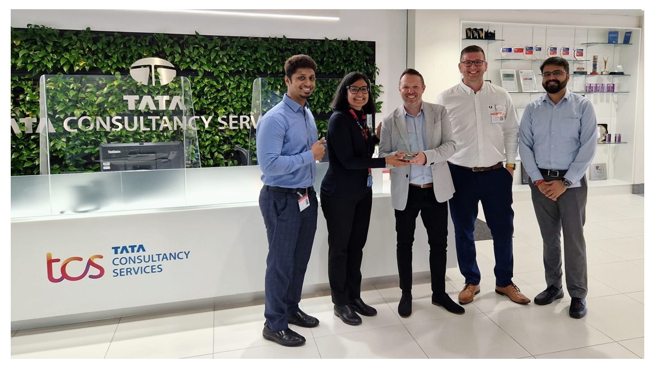 Wave Search receiving a TCS partner award at Tata Consultancy Services